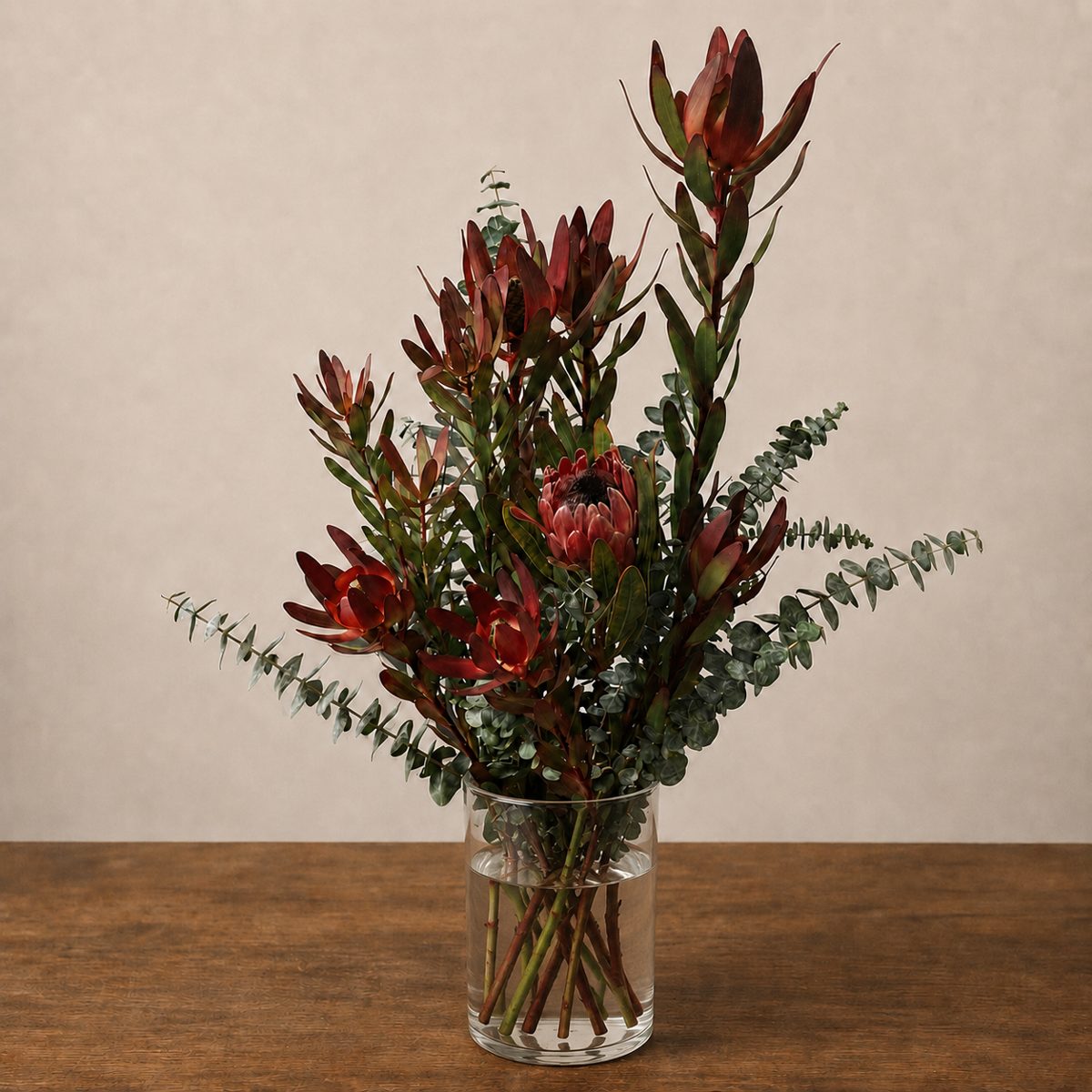Protea and eucalyptus arrangement